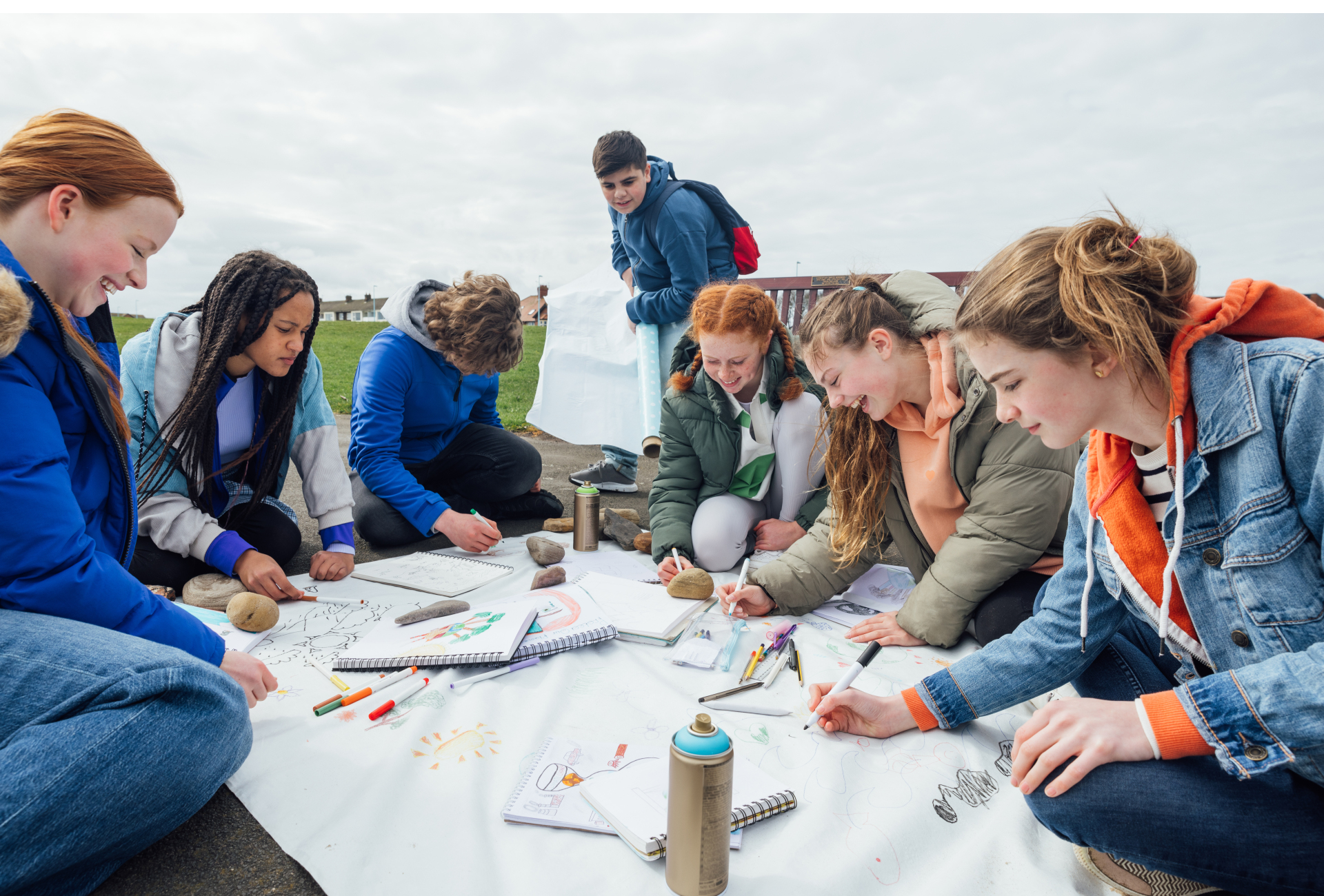 Students creating nature artwork